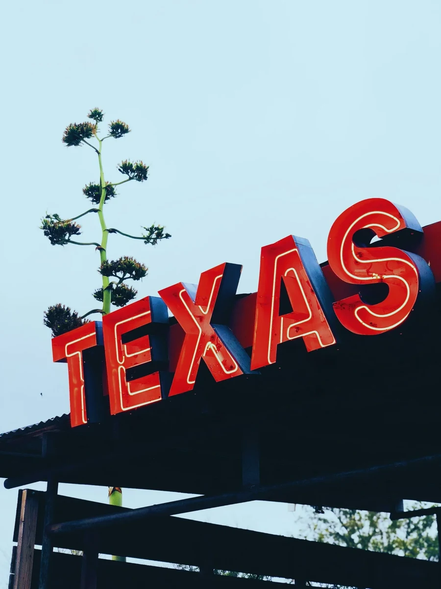 Texas sign against the sky